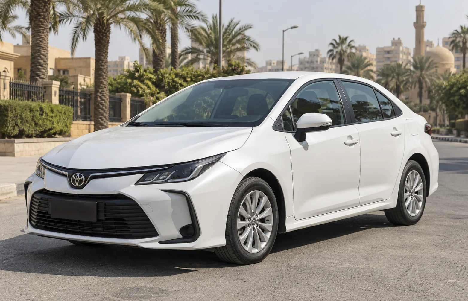 Illustrative white Toyota Corolla sedan on a Cairo street